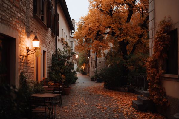 Cozy Alley With Café, Fall Atmosphere and Fallen Autumn Leaves Free Image