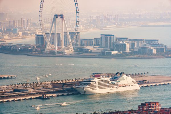 Cruise Ship in Dock at Palm Jumeirah Under Ain Dubai Wheel Free Photo