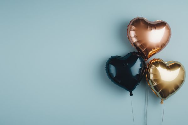Free Valentine’s Day Background with Inflatable Heart Balloons Free Image