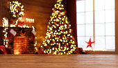 interior christmas. magic glowing tree, fireplace, gifts