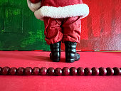 Vintage Santa Facing Red and Green Abstract Paintings