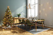 Dining Room Interior With Christmas Tree, Gift Boxes And Christmas Table Setting
