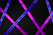 Cyber Monday sale background with vibrant purple ribbons, dark diagonal layout